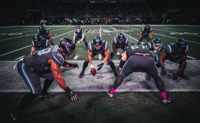 Los Angeles Chargers defensive end Joey Bosa rushing the passer during an NFL game in 2025