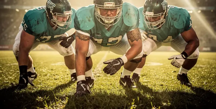Von Miller in Washington Commanders uniform rushing the passer during an NFL game